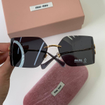 Солнцезащитные очки MIU MIU