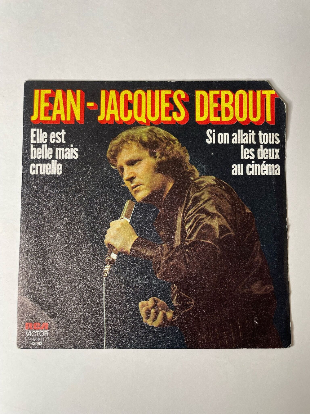 Винтажная виниловая пластинка LP Jean Jacques Debout Elle Est Belle Mais Cruelle / Si On Allait Tous Les Deux Au Cinema (France 1975) 7 дюймов