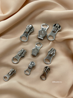 Собачка (бегунок) серебристая