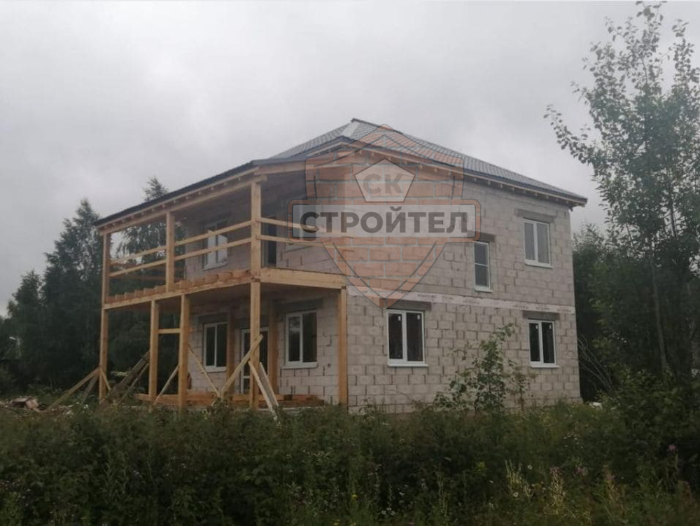 Строительство двухэтажного дома из блоков 210 м2