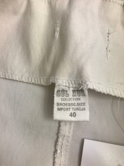 Брюки с контрастными карманами 40 размер