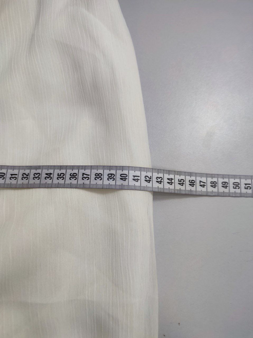 Юбка светлая на 12 лет, новая с браком