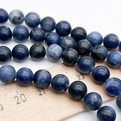 Содалит бусины, диаметр около 8-8,2 мм, цена за 11-12 шт (1/4 нити)