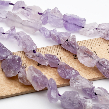 Аметист бусины, необработанный, размер около 8-11 мм, цена за набор 9-10 бусин (1/4 нити)