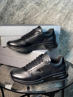 Кроссовки Prada