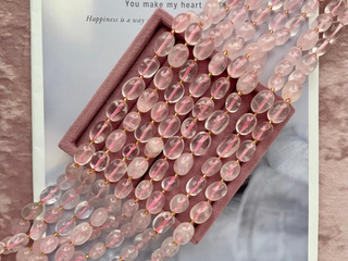 Нить бусин из розового кварца 12-16мм (галтовка)