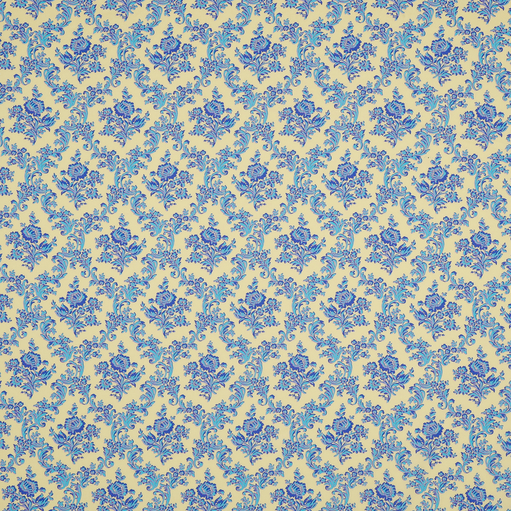 Легкий батист нежно желтого цвета с голубым цветочным узором