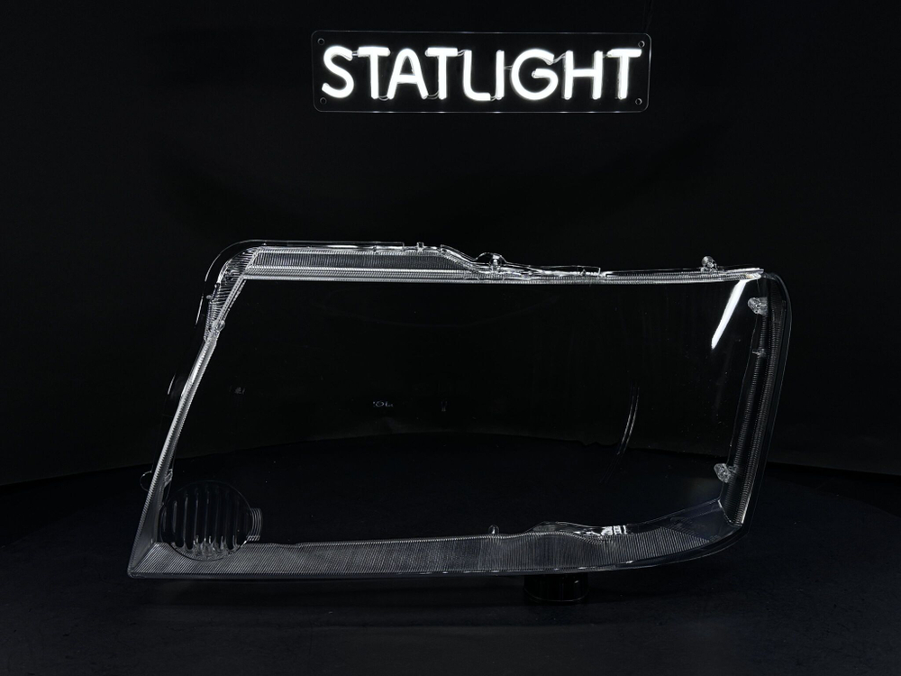 Левое стекло фары Nissan Patrol Y61 2004-2024 рест