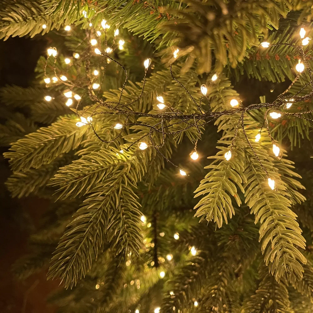 Светодиодная нить кластер 960 теплых белых ламп, 6 м., 24В, 8 режимов, таймер, черный провод, LUCA (85409)