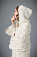 Описание по вязанию пуловера спицами "Cabled"