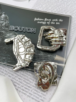 Пуговицы серебристые Скиапар. "Рука"