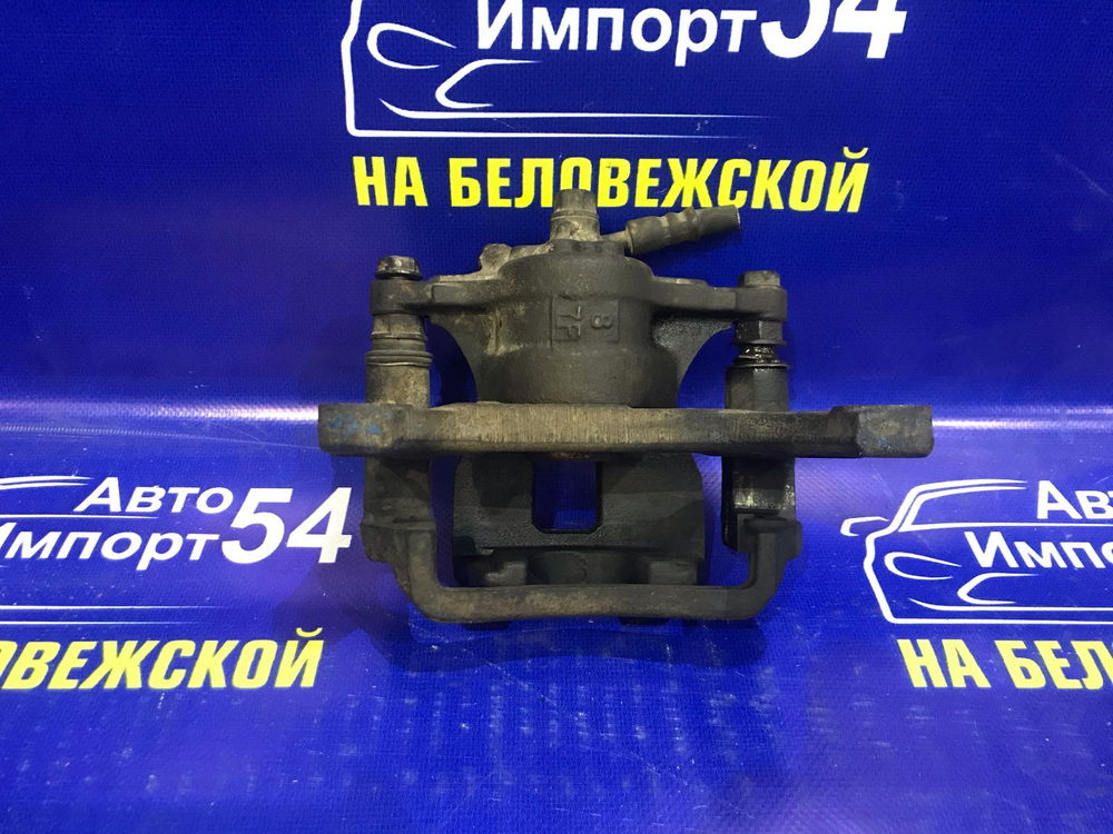 Суппорт тормозной задний правый TOYOTA REGIUS 1999
