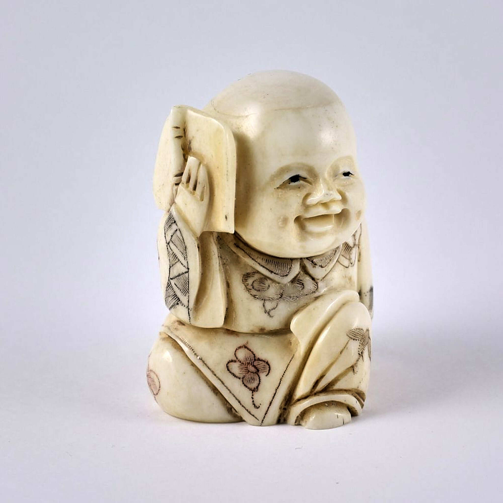 Нэцкэ Ребенок карако с письменными принадлежностями