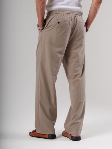 Бежевые брюки Laine