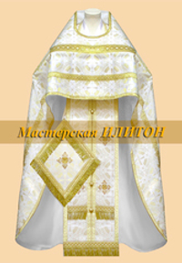 Облачение белое с золотом из парчи.