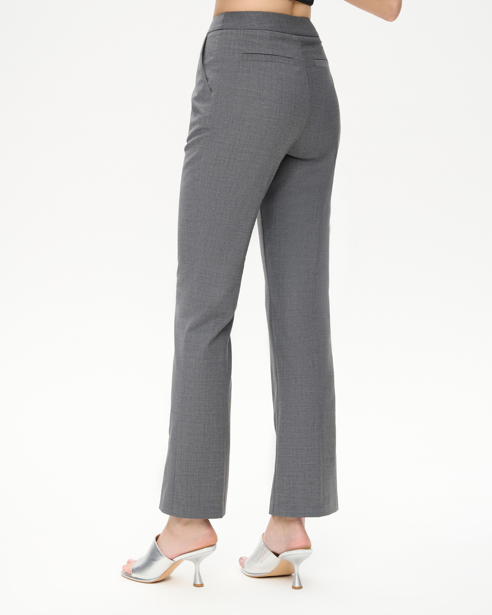 Брюки зауженные из костюмной ткани с разрезами на молнии