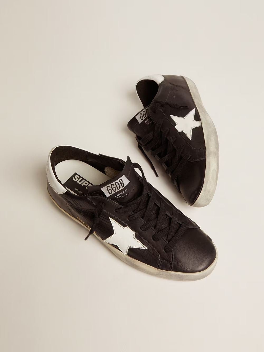 Super Star in black leather with white leather star and heel tab