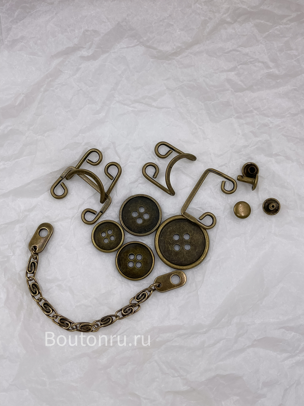 Крючок на стойку воротника с хольнитенами бронза