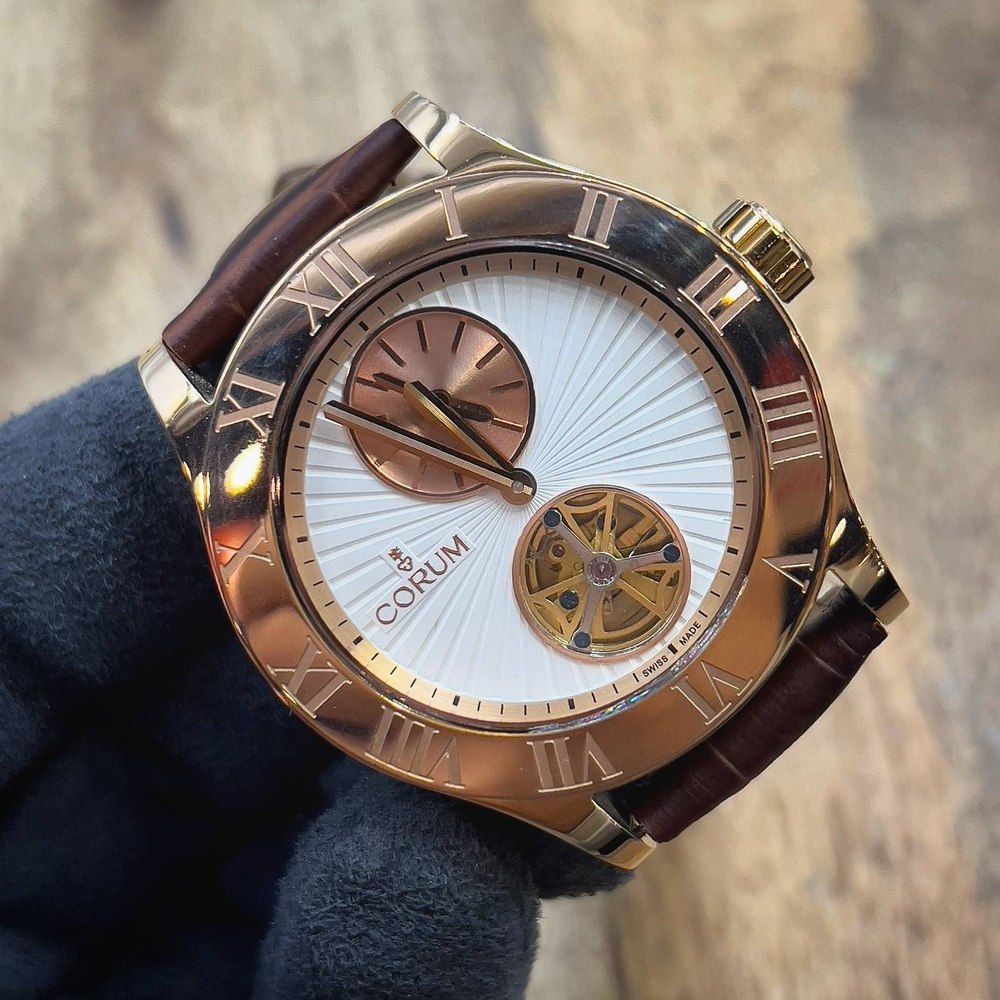 Часы Corum
