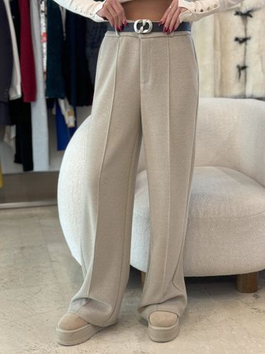 Прямые брюки бежевого цвета с узором