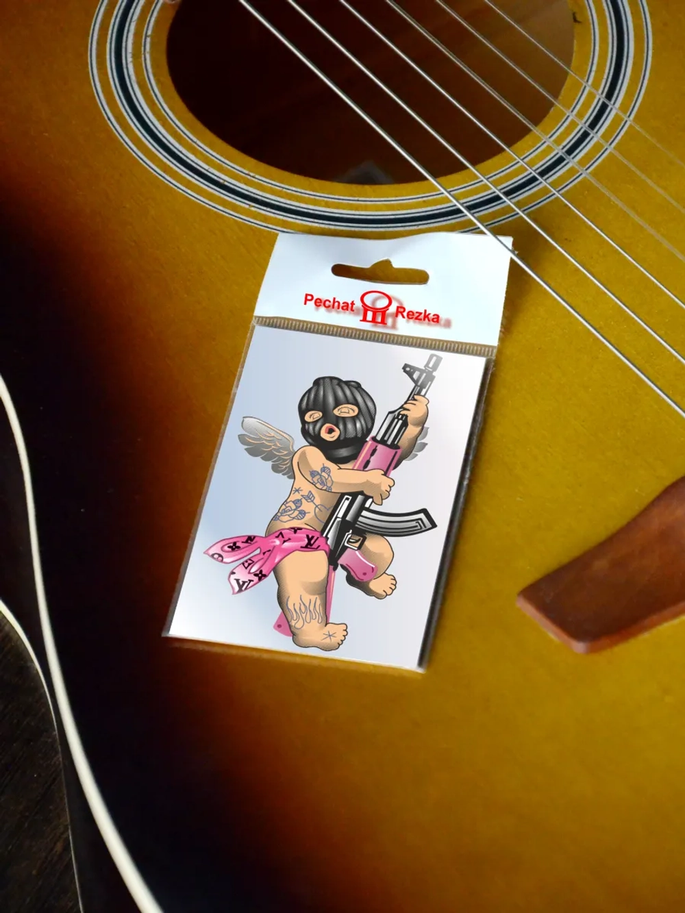 Стикер - Купидон Ангел с автоматом