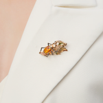 Брошь «Жук-олень» из красного золота с янтарём