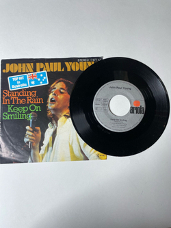Винтажная виниловая пластинка LP John Paul Young Standing In The Rain / Keep On Smiling (Germany 1977) 7 дюймов