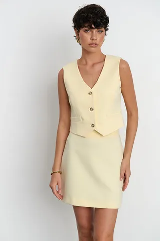 Юбка мини костюмная цвета ваниль