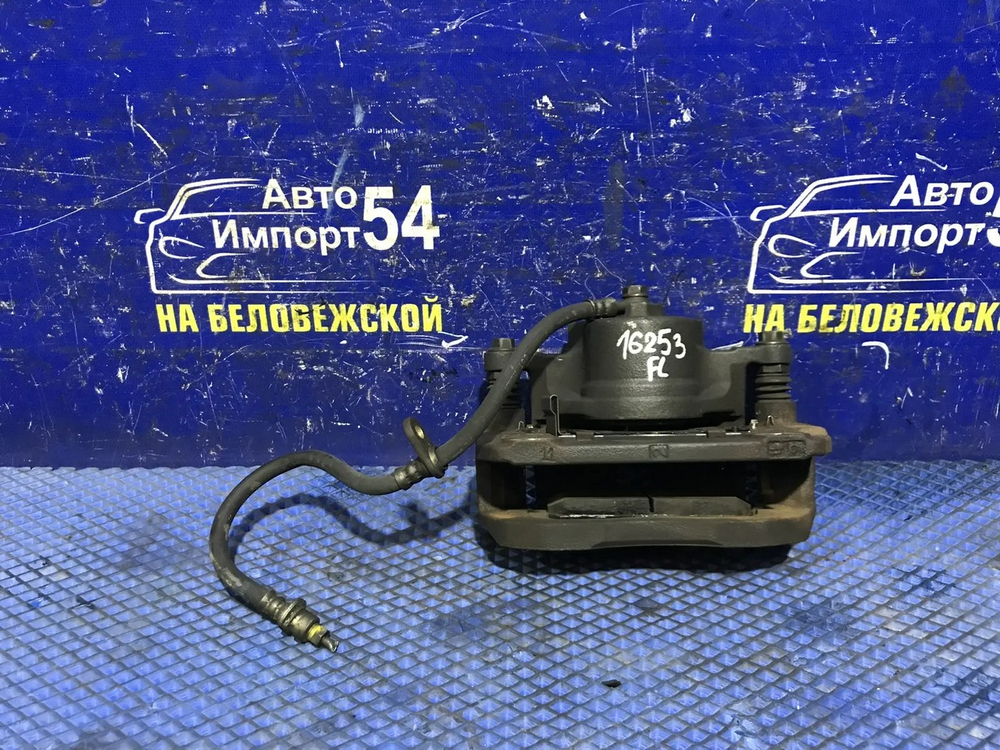 Суппорт тормозной передний левый Honda ODYSSEY 1998-2004