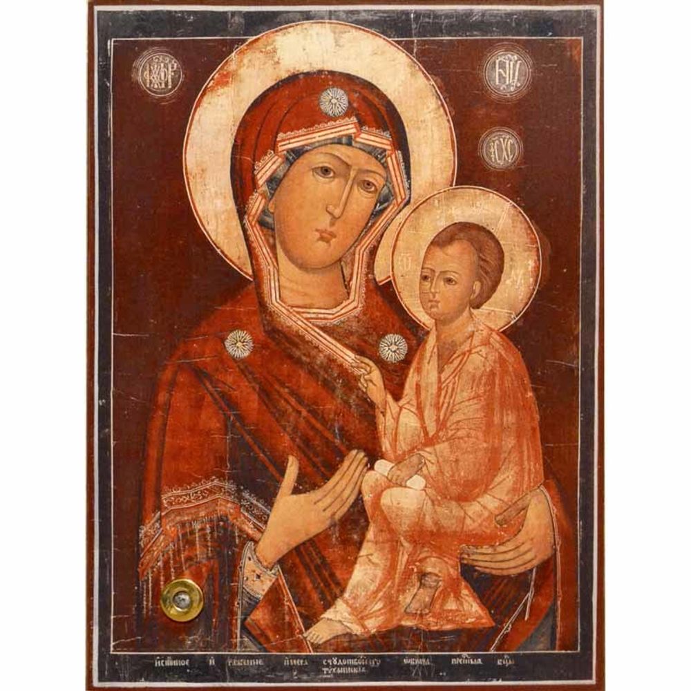 Тихвинская икона Божьей Матери на доске с мощевиком.