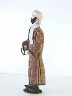 Кукла фарфоровая Узбек в традиционном костюме