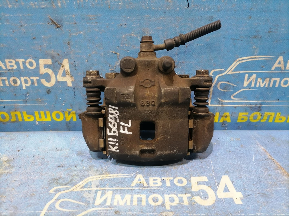 Суппорт тормозной передний левый NISSAN MARCH 1997-2002