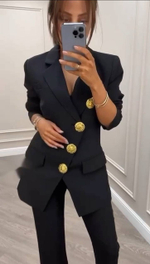 Женский брючный костюм