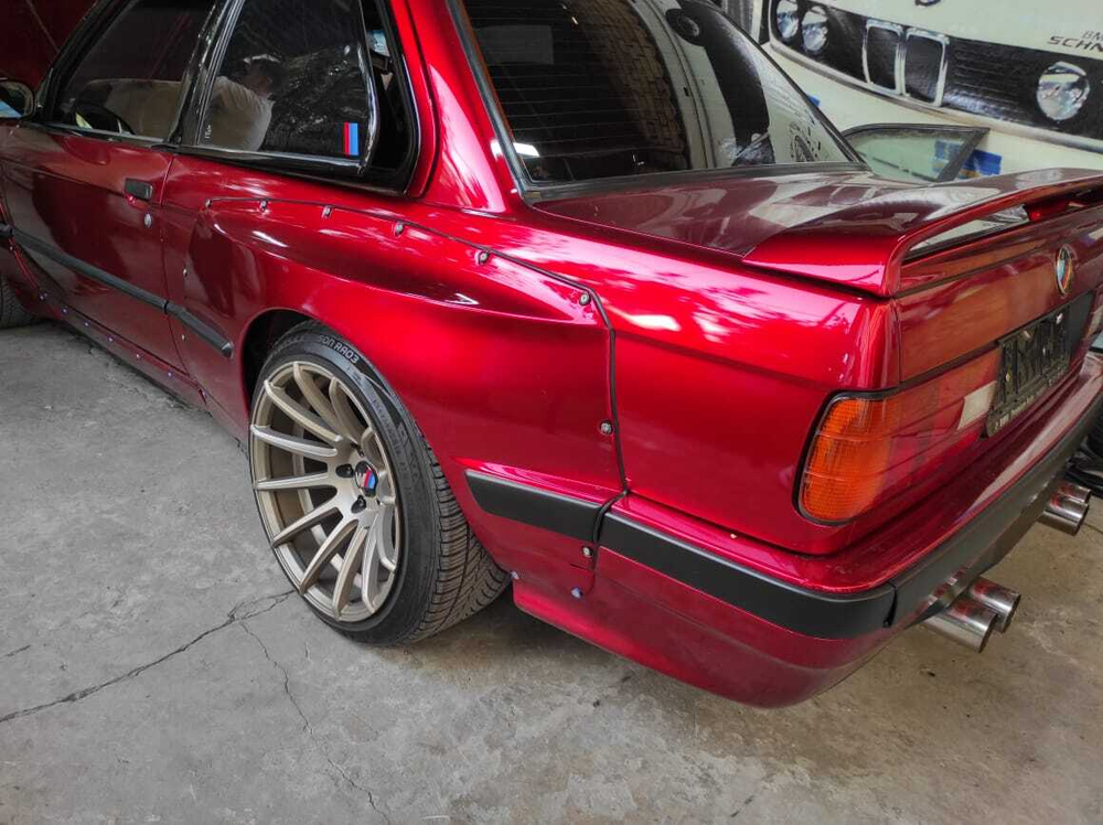 BMW E30 PANDEM (ROCKET BUNNY) Задняя левая накладка (Реплика "Стекловолокно")