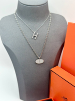 Кулон Hermes буква