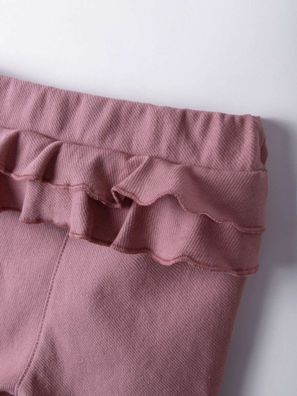 Брюки из джинскота с рюшей 