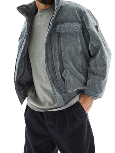 Утепленный серо-голубой бомбер из вареного денима