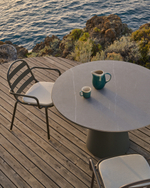 Уличный стол Tudons из алюминия с зеленой столешницей Ø120 см