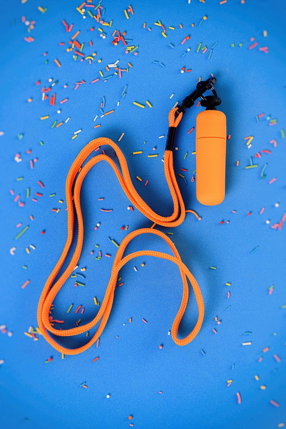 Оранжевая вибропуля на ремешке - 5,5 см. (Цвет: оранжевый)