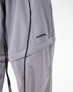 GREY TRANSFORMING  TRACKPANTS