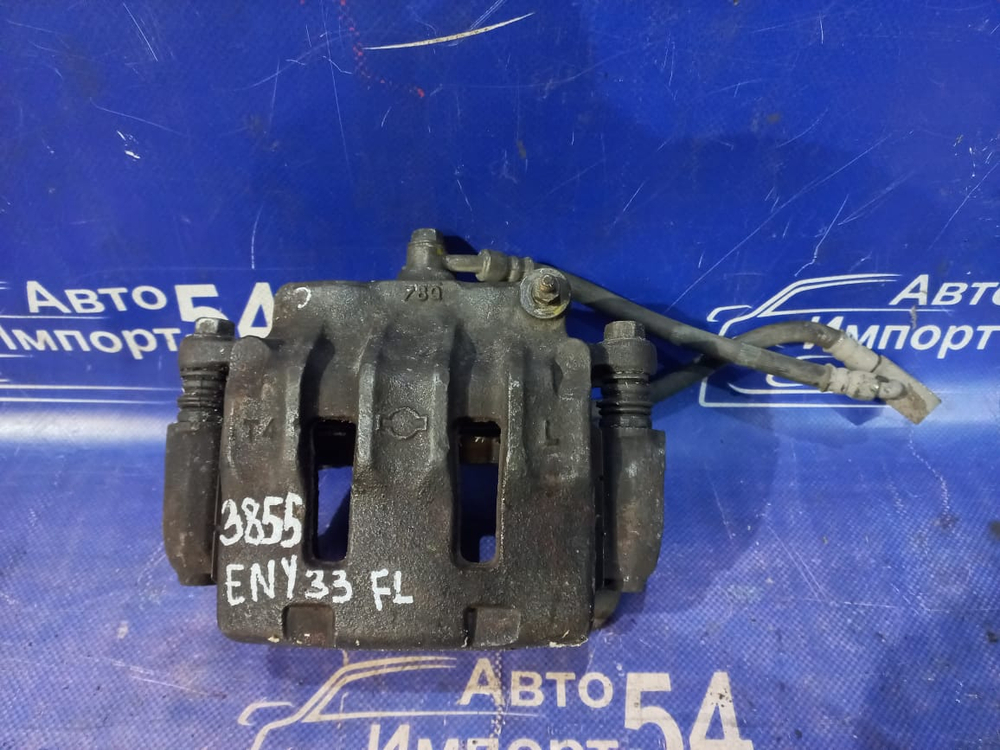 Суппорт тормозной передний левый NISSAN CEDRIC 1997-1999