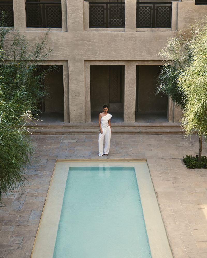 Брюки в полоску белые