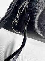 Женская сумка-кисет черного цвета