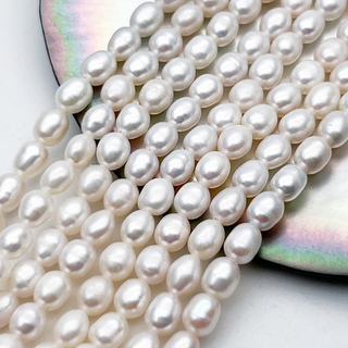 Жемчуг Рис бусины, размер около 4,8-5*3,8-4,2 мм, цена за отрезок 18 см (1/2 нити)