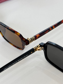 Miu Miu Glasses
