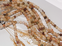 Нить бусин из тонированного кварца 6,5мм