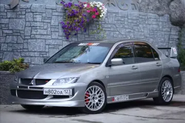 Юбка переднего бампера в стиле EVO для Mitsubishi Lancer 9