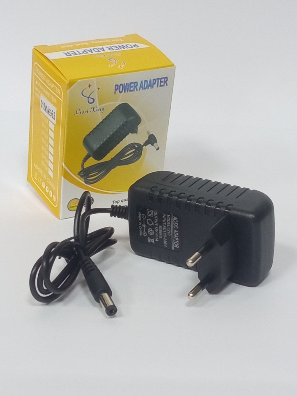 Адаптер питания DC 12V/1A штекер 5.5мм. универсальный 1210