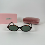 Солнцезащитные очки Miu Miu