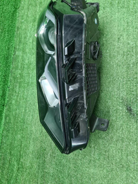 Фара левая Geely Coolray (2019-2024) галоген